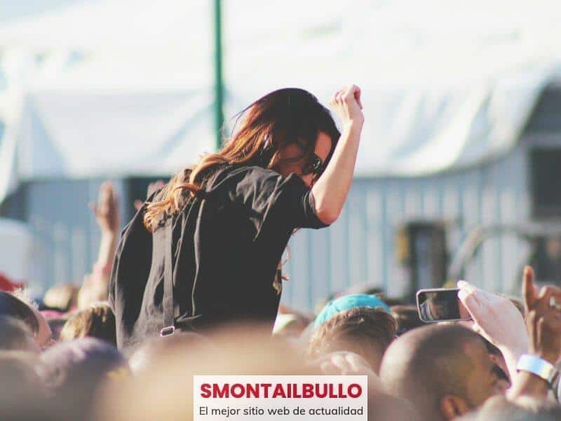 woman on top of crowd