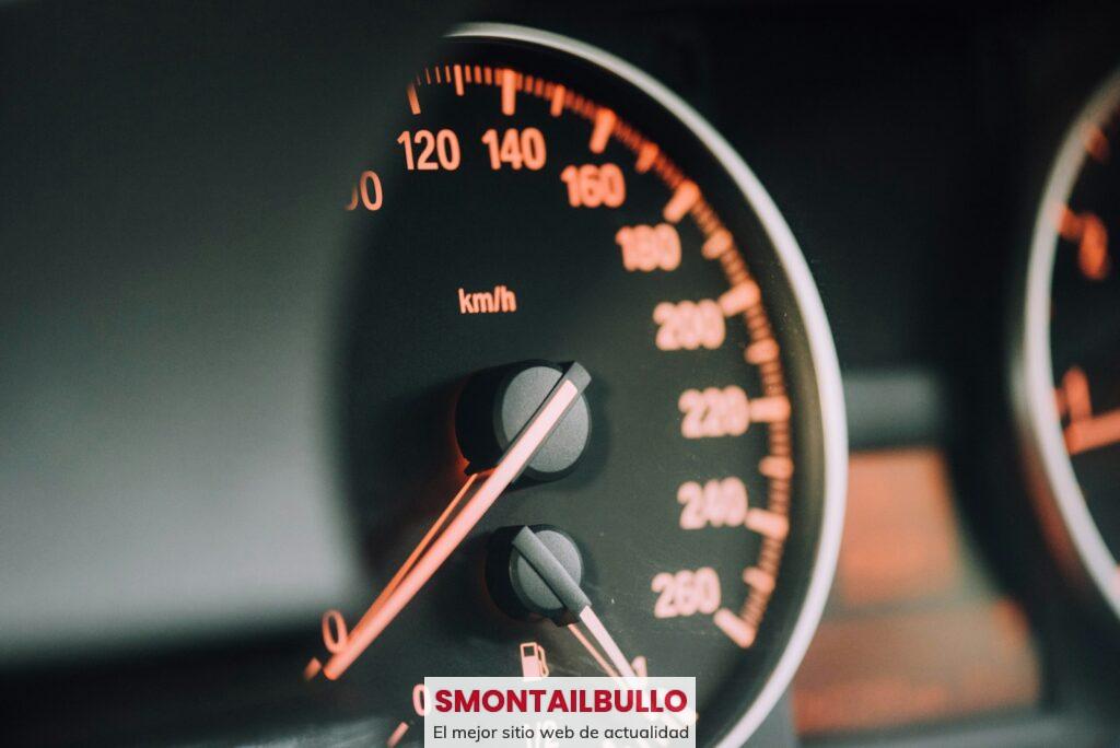 closeup photo of black analog speedometer